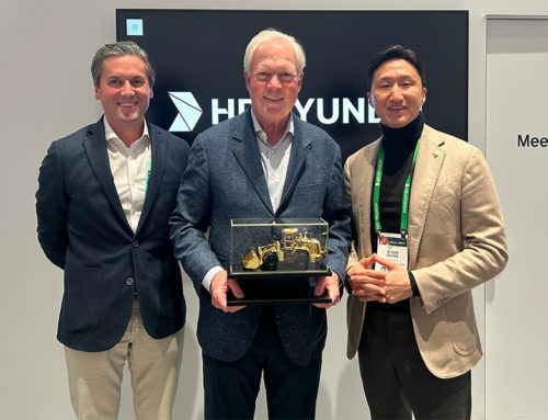 Kisun Chung, Vice Chairman of HD Hyundai, Presents A Golden Loader Award to NED Top Executives During CES Show in Las Vegas